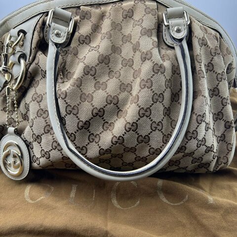 Gucci 雙 G 老花軟貝殼手提斜挎包