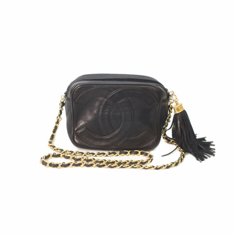 香奈兒黑色小羊皮迷你肩背包，搭配金色五金配件、Coco標誌和流蘇 - 女士