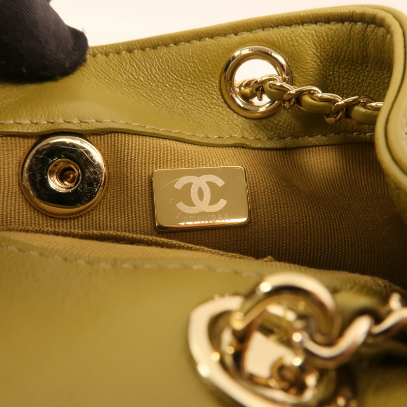 CHANEL 牛皮皮革Duma金扣背包-6