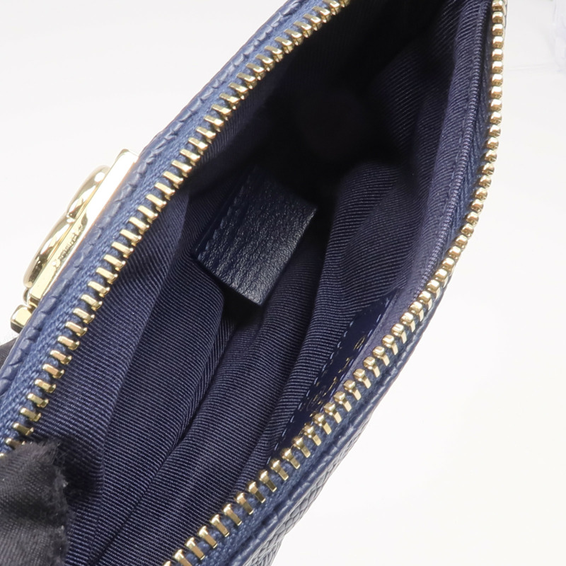 CHANEL 牛皮皮革Boy Pouch金扣手拿包-11