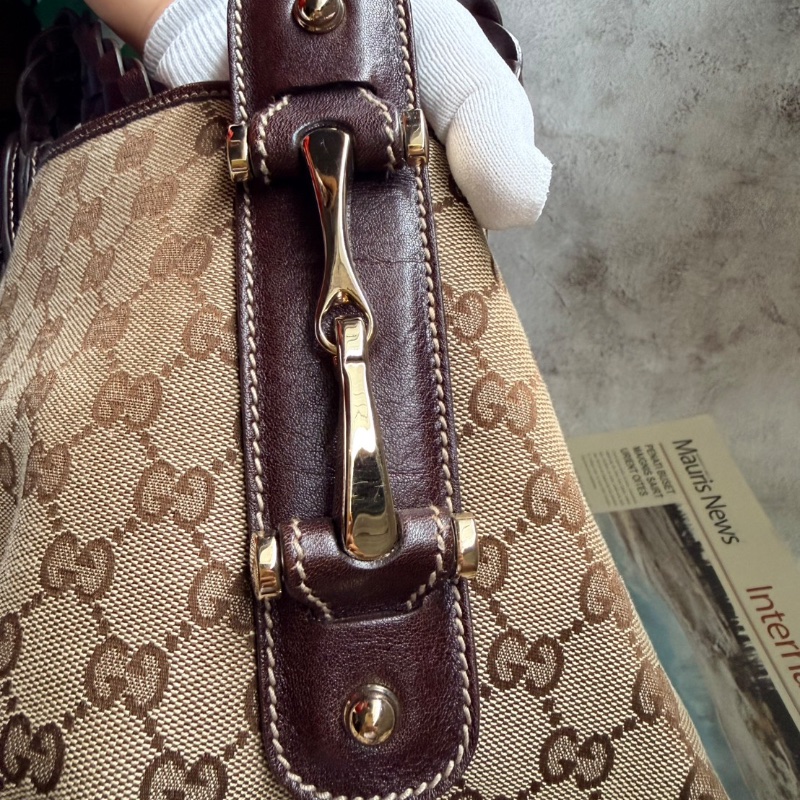 Gucci 最具代G表性的「編織帶緹花布馬銜包」-3