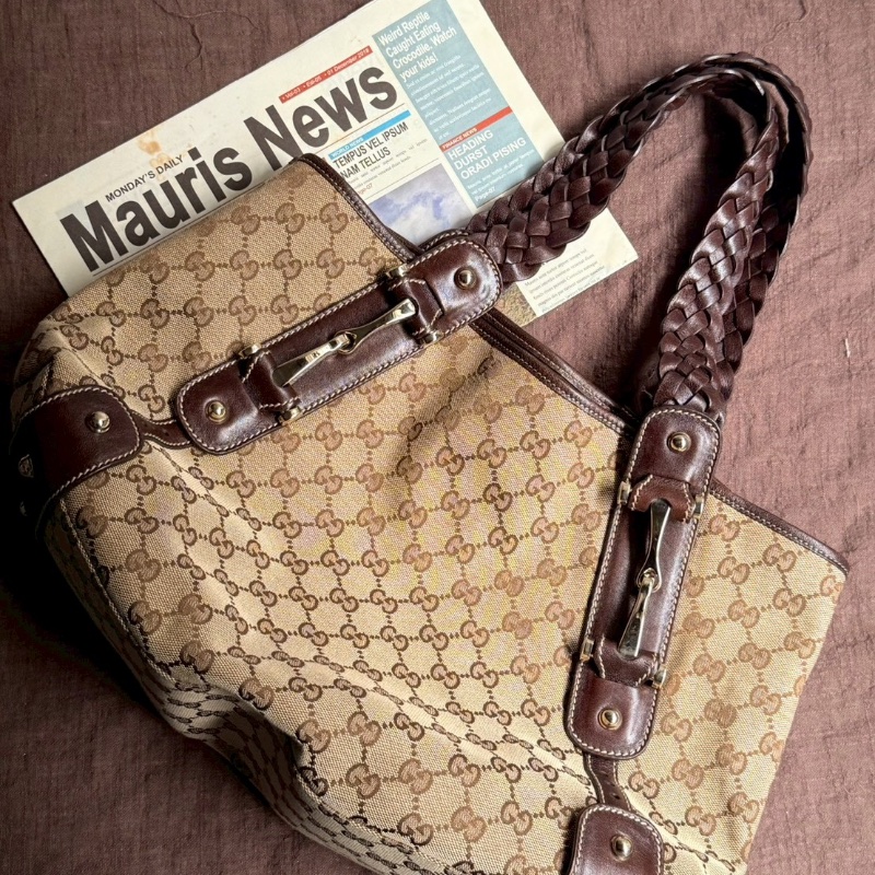 Gucci 最具代G表性的「編織帶緹花布馬銜包」-5