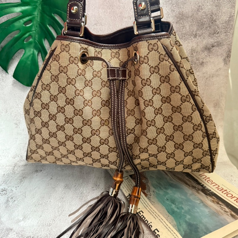GUCCI GG緹花帆布竹節流蘇編織包-0