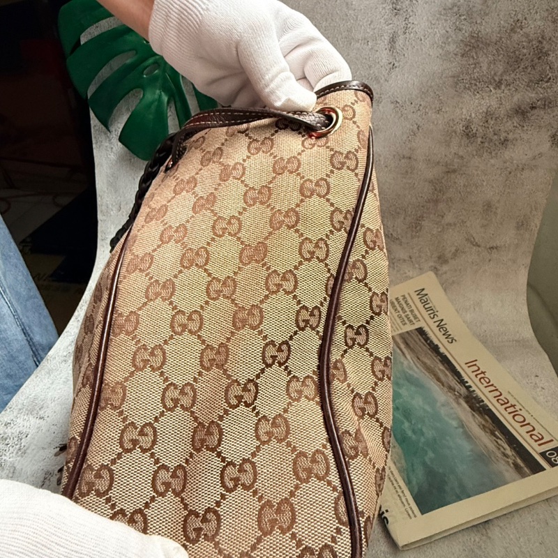 GUCCI GG緹花帆布竹節流蘇編織包-1