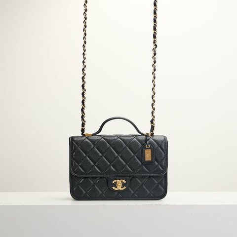 Chanel 22k 手柄郵差包/黑金牛
