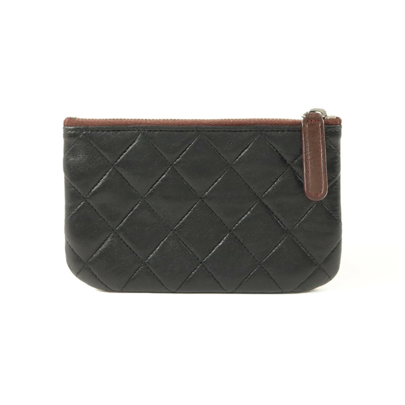 CHANEL 羊皮皮革Mini Zip Pouch手拿包-1