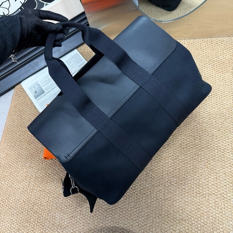 愛馬仕/Hermes大號黑色帆布拼皮蘑菇包 手提電腦包 男女適用 輕便 配件子包 塵袋