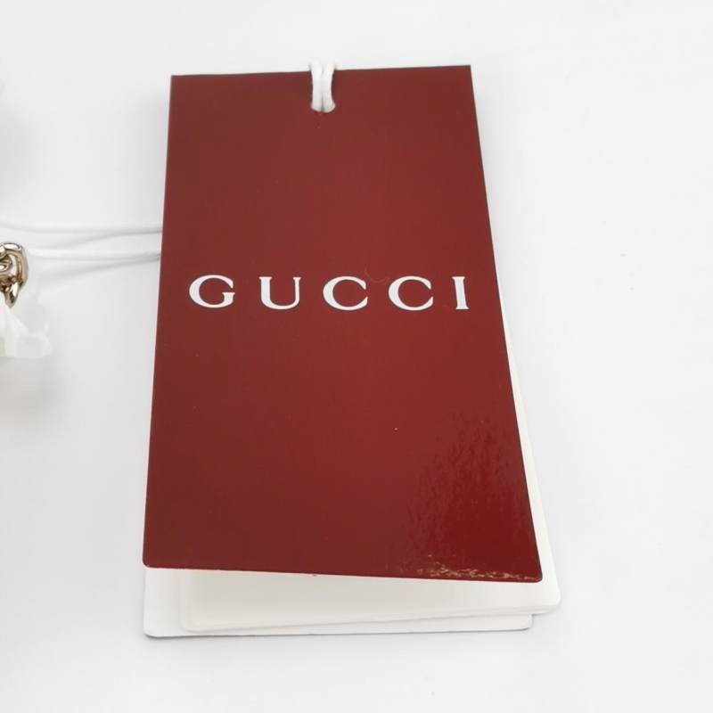 Gucci GG Marmont迷你羊皮V紋絎縫雙G標誌口蓋包斜背包-8