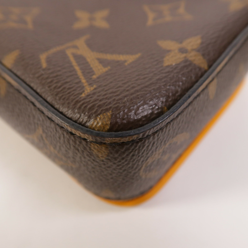 LOUIS VUITTON Monogram S-Lock Vertical Wearable Wallet肩背袋-12