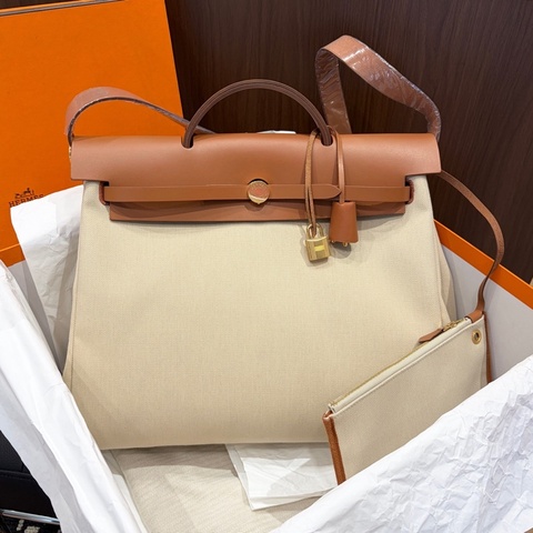 全新閒置U刻Hermes愛馬仕金棕米色帆布herbag39 手提斜挎包 有鎖鑰匙 附件：防塵袋 盒子