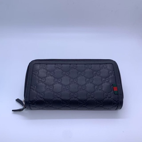 二手 gucci 男士錢包黑色，正常使用痕跡，邊角五金磨損，如圖