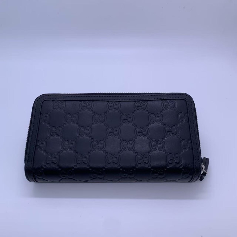 二手 gucci 男士錢包黑色，正常使用痕跡，邊角五金磨損，如圖-1