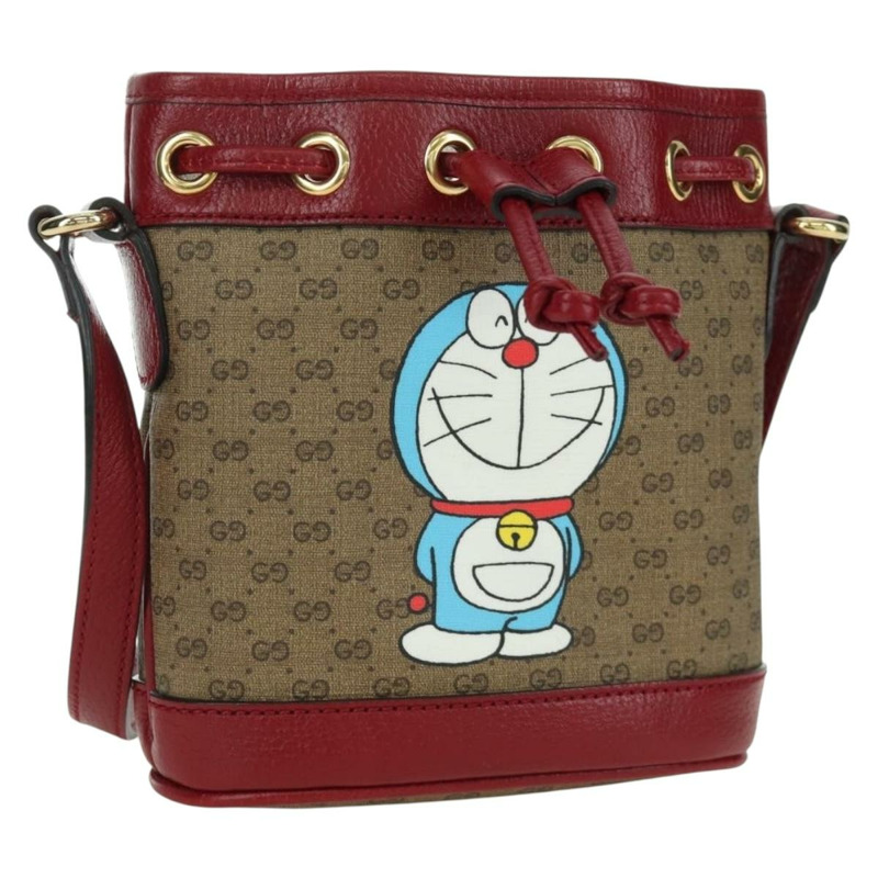 【日本直送】GUCCI GUCCI × Doraemon Micro GG Supreme Bag PVC 米色金色 647801 正品 LNZ389SM-0