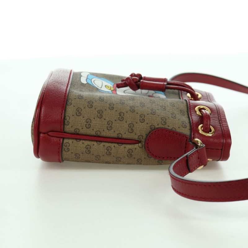 【日本直送】GUCCI GUCCI × Doraemon Micro GG Supreme Bag PVC 米色金色 647801 正品 LNZ389SM-3