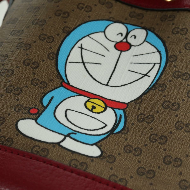 【日本直送】GUCCI GUCCI × Doraemon Micro GG Supreme Bag PVC 米色金色 647801 正品 LNZ389SM-18