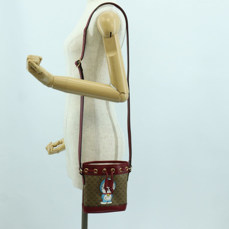 【日本直送】GUCCI GUCCI × Doraemon Micro GG Supreme Bag PVC 米色金色 647801 正品 LNZ389SM-22