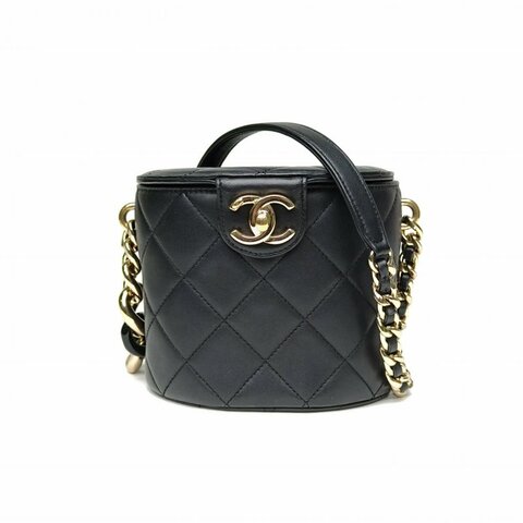 CHANEL 20C圓桶化妝包金屬按扣黑色羊皮29開金扣亞克力肩背包