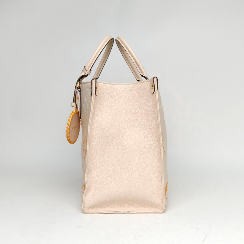 LOUIS VUITTON Onthego中號35黃色牛皮晶片老花壓紋肩背包-1