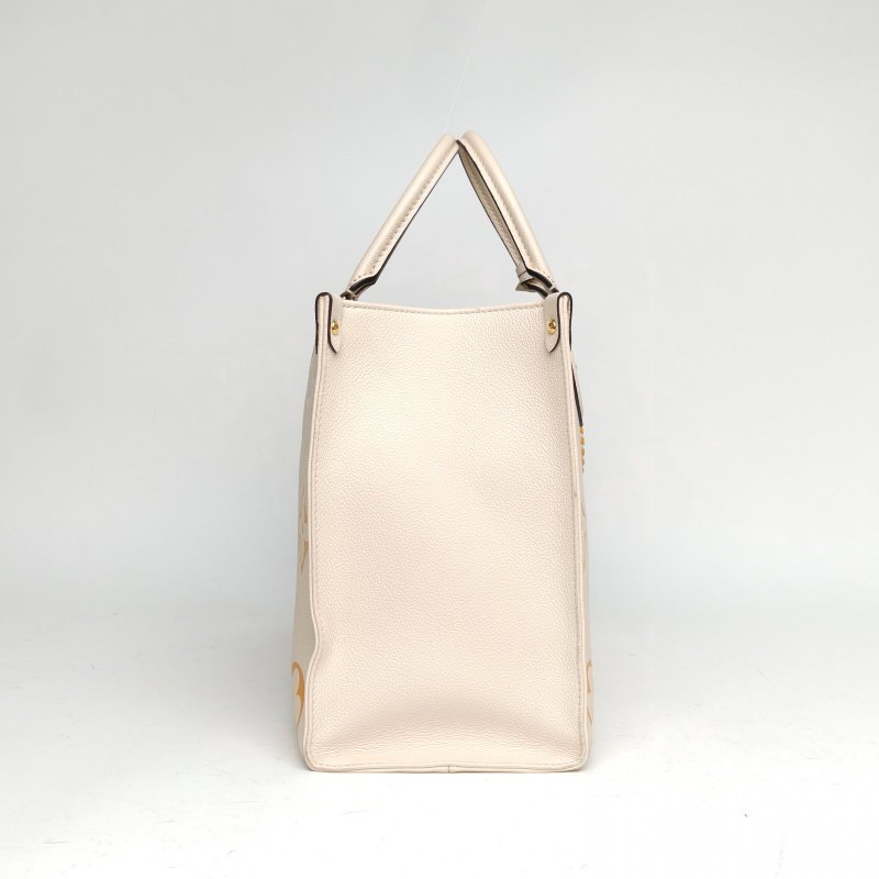 LOUIS VUITTON Onthego中號35黃色牛皮晶片老花壓紋肩背包-3