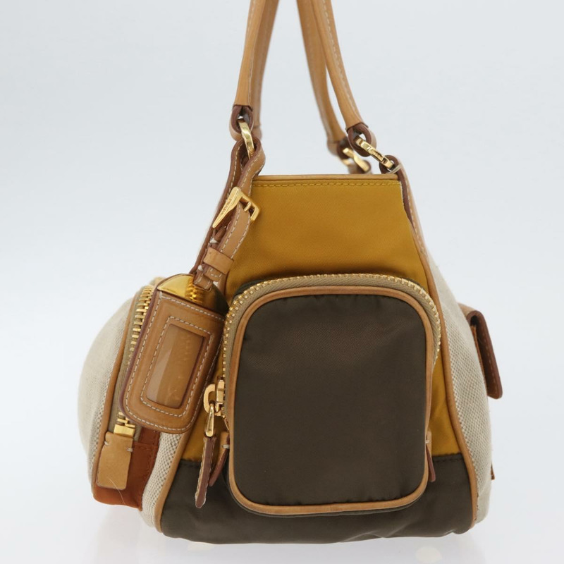 【日本直送】PRADA 手袋 帆布 金色 米色 正品 YKZ552A-2