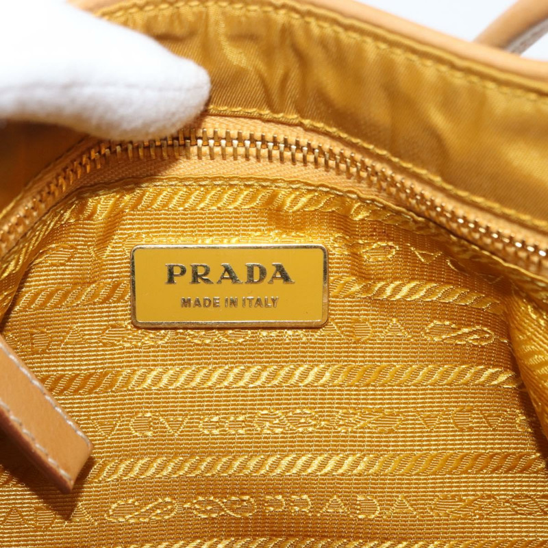 【日本直送】PRADA 手袋 帆布 金色 米色 正品 YKZ552A-18