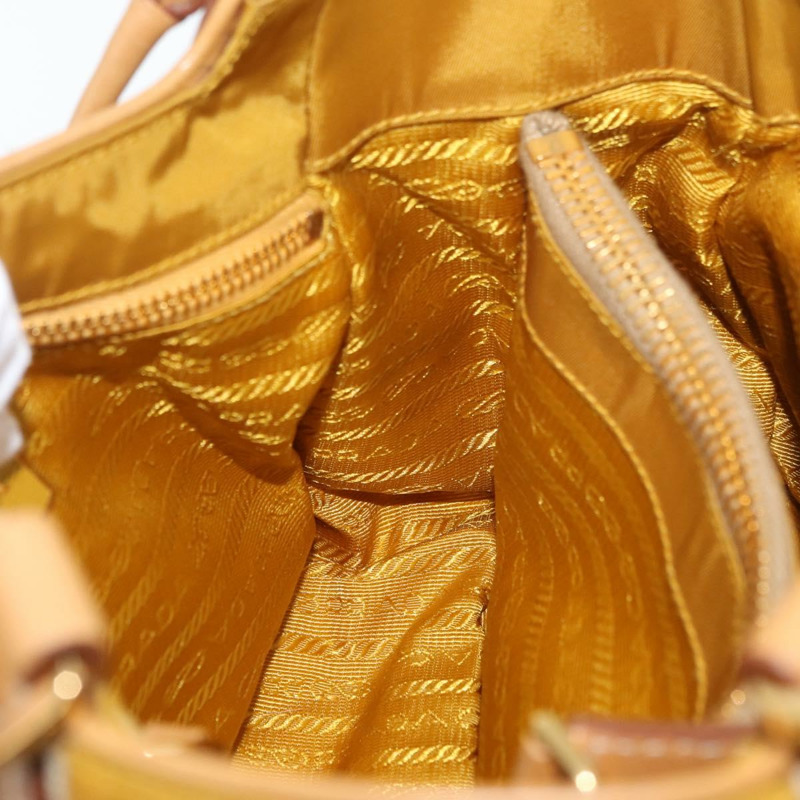 【日本直送】PRADA 手袋 帆布 金色 米色 正品 YKZ552A-19