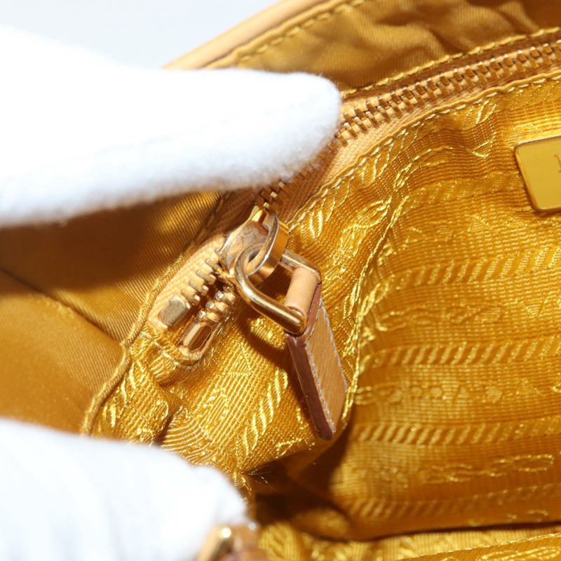 【日本直送】PRADA 手袋 帆布 金色 米色 正品 YKZ552A-24