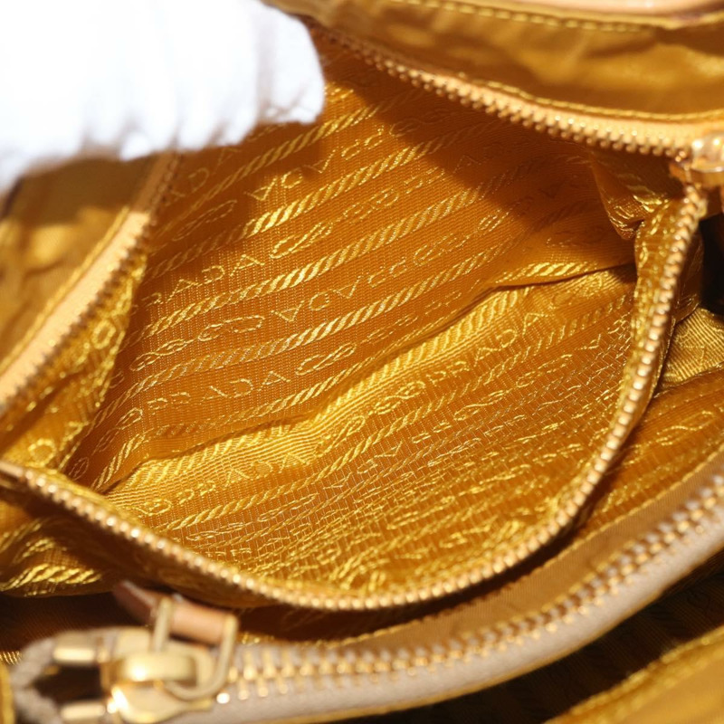 【日本直送】PRADA 手袋 帆布 金色 米色 正品 YKZ552A-25