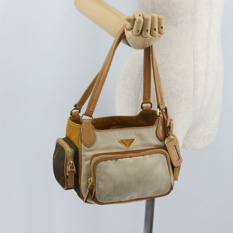 【日本直送】PRADA 手袋 帆布 金色 米色 正品 YKZ552A-28