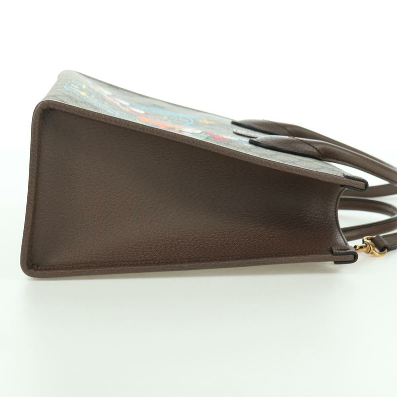 【日本直送】GUCCI GG Supreme 唐老鴨迪士尼聯名款 PVC 雙面米色 648134 正品 BAZ859SM-3