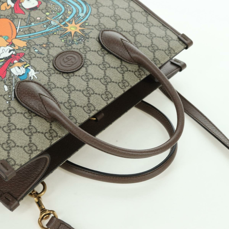 【日本直送】GUCCI GG Supreme 唐老鴨迪士尼聯名款 PVC 雙面米色 648134 正品 BAZ859SM-5