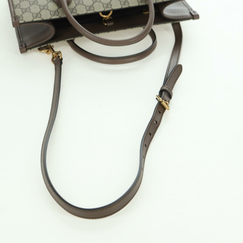 【日本直送】GUCCI GG Supreme 唐老鴨迪士尼聯名款 PVC 雙面米色 648134 正品 BAZ859SM-7