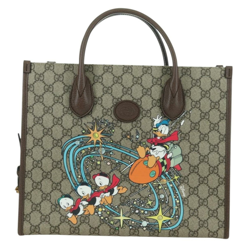 【日本直送】GUCCI GG Supreme 唐老鴨迪士尼聯名款 PVC 雙面米色 648134 正品 BAZ859SM-12