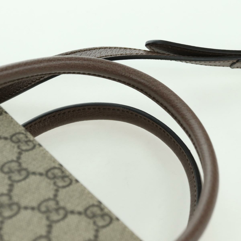 【日本直送】GUCCI GG Supreme 唐老鴨迪士尼聯名款 PVC 雙面米色 648134 正品 BAZ859SM-13