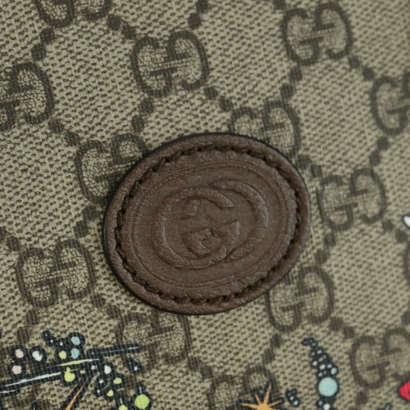 【日本直送】GUCCI GG Supreme 唐老鴨迪士尼聯名款 PVC 雙面米色 648134 正品 BAZ859SM-18