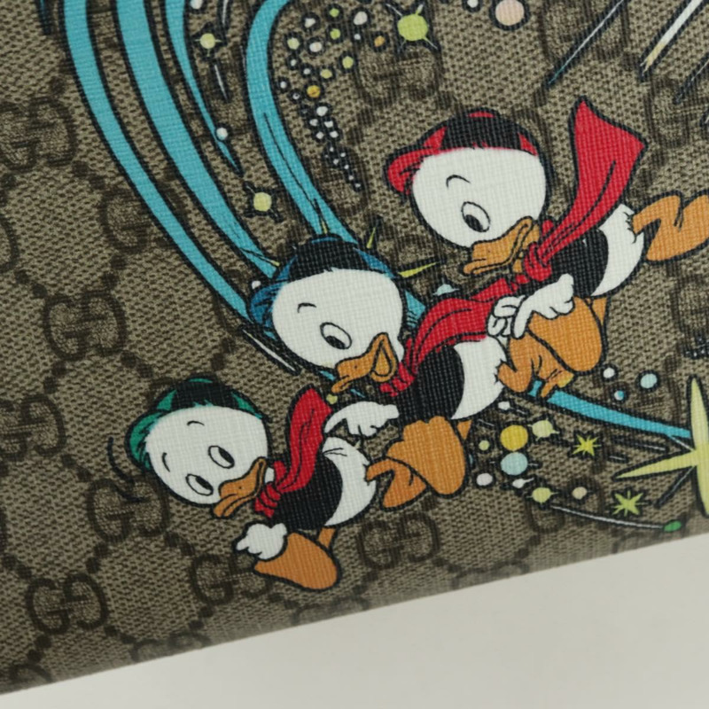 【日本直送】GUCCI GG Supreme 唐老鴨手提包 PVC 兩用 米色金色 648134 正品 YKZ1358M-16