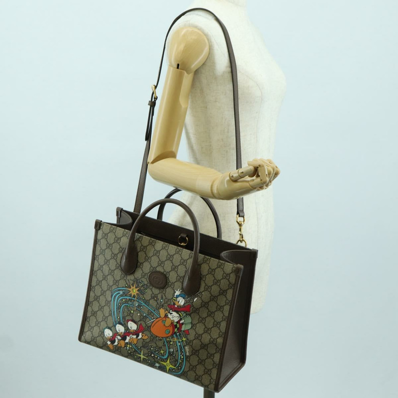 【日本直送】GUCCI GG Supreme 唐老鴨手提包 PVC 兩用 米色金色 648134 正品 YKZ1358M-25