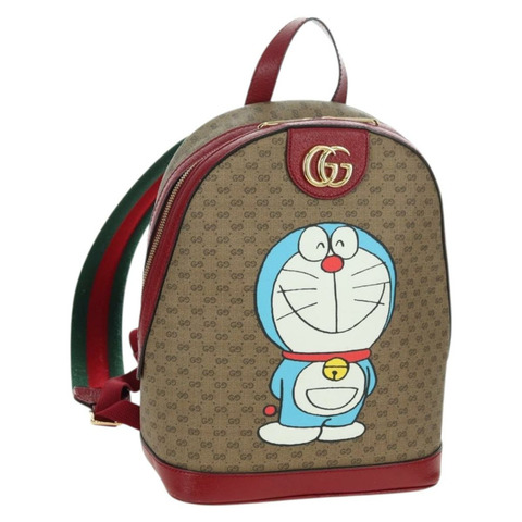 GUCCI Micro GG Supreme哆啦A夢雙肩包 PVC 米色 金色 647816 正品 YKZ1360M