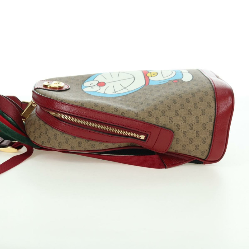 【日本直送】GUCCI Micro GG Supreme哆啦A夢雙肩包 PVC 米色 金色 647816 正品 YKZ1360M-2