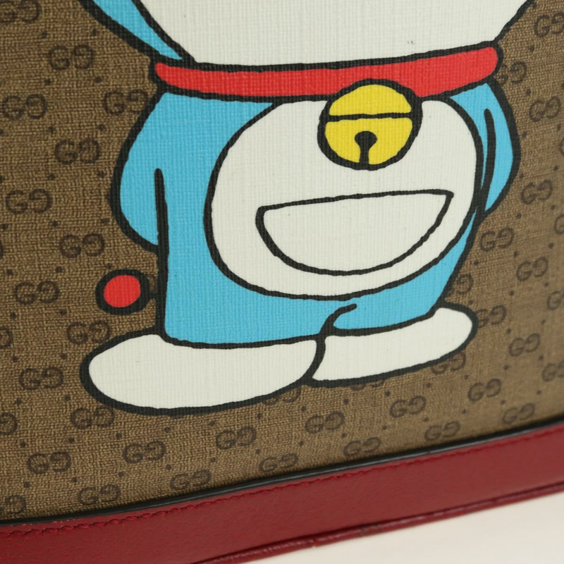 【日本直送】GUCCI Micro GG Supreme哆啦A夢雙肩包 PVC 米色 金色 647816 正品 YKZ1360M-19