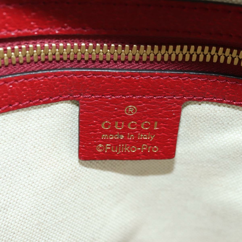 【日本直送】GUCCI Micro GG Supreme哆啦A夢雙肩包 PVC 米色 金色 647816 正品 YKZ1360M-22