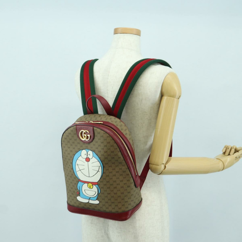 【日本直送】GUCCI Micro GG Supreme哆啦A夢雙肩包 PVC 米色 金色 647816 正品 YKZ1360M-27