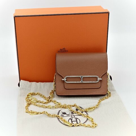 HERMES 愛馬仕 ROULIS 金棕 簡約金屬LOGO山羊皮翻蓋短小廢包 斜背包