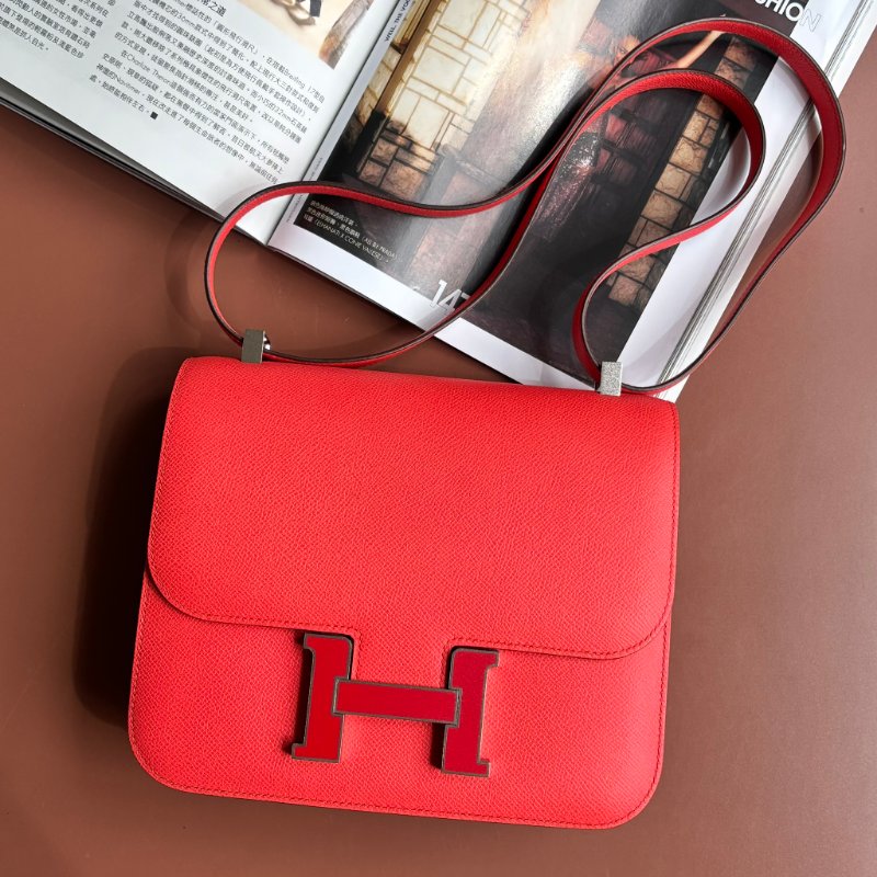 ::HERMES:: 愛馬仕 桃粉色銀邊琺瑯釦康康24 Constance 24-0