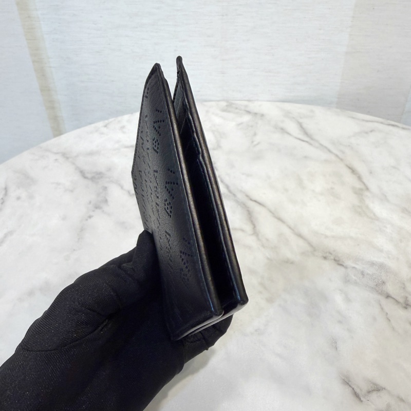 Balenciaga 黑牛皮雷射洞洞對開8卡短夾-1