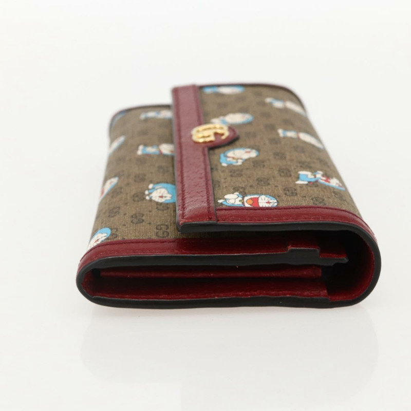 【日本直送】GUCCI Micro GG Supreme哆啦A夢長皮夾 PVC 米色金色 647786 正品 175793A-3