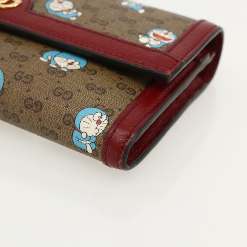 【日本直送】GUCCI Micro GG Supreme哆啦A夢長皮夾 PVC 米色金色 647786 正品 175793A-6
