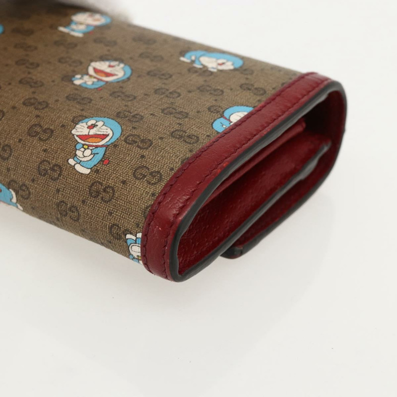 【日本直送】GUCCI Micro GG Supreme哆啦A夢長皮夾 PVC 米色金色 647786 正品 175793A-14