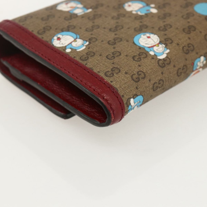 【日本直送】GUCCI Micro GG Supreme哆啦A夢長皮夾 PVC 米色金色 647786 正品 175793A-15
