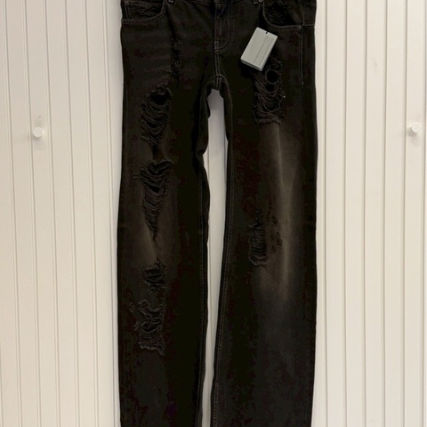 巴黎世家黑色水洗破壞牛仔褲